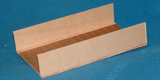 Sides glued to floor